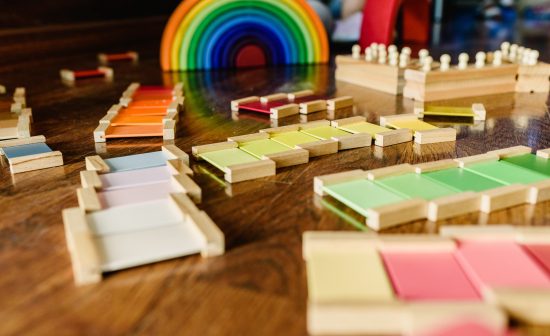 Children playing with wooden rainbow waldorf montessori