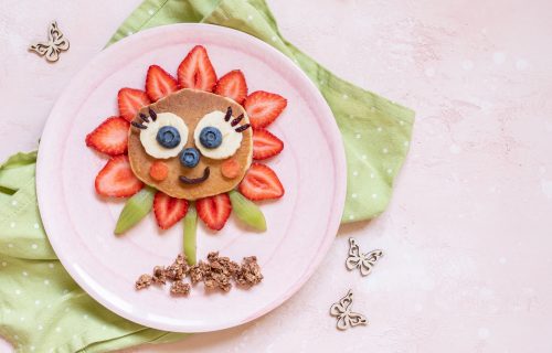 Cute Flower Pancake with berries for kids breakfast