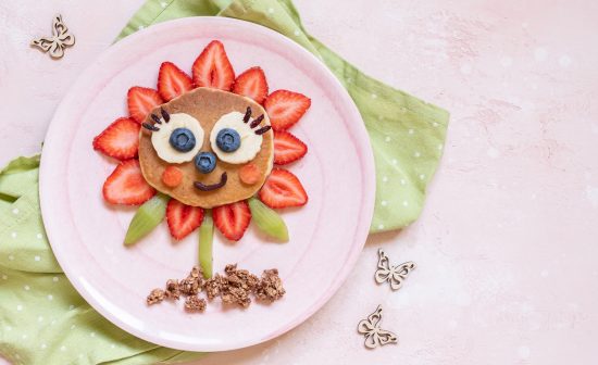 Cute Flower Pancake with berries for kids breakfast