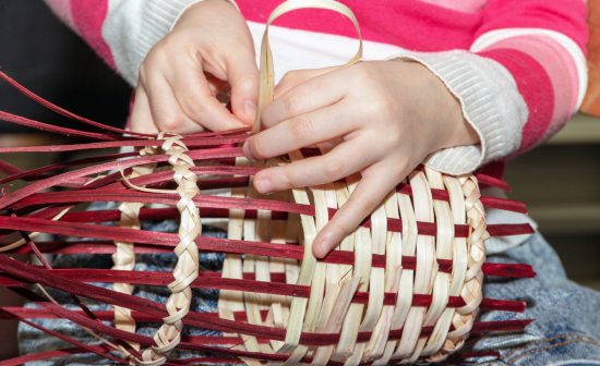 The,Girl,Weaves,A,Willow,Ribbon.,Children's,Hands,Make,Wicker