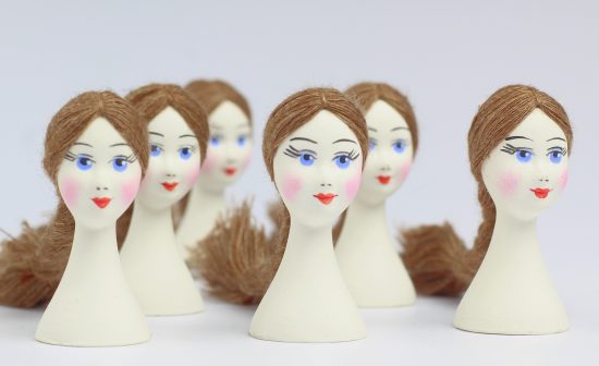 White,Porcelain,Heads,With,A,Painted,Face,For,Making,Dolls.