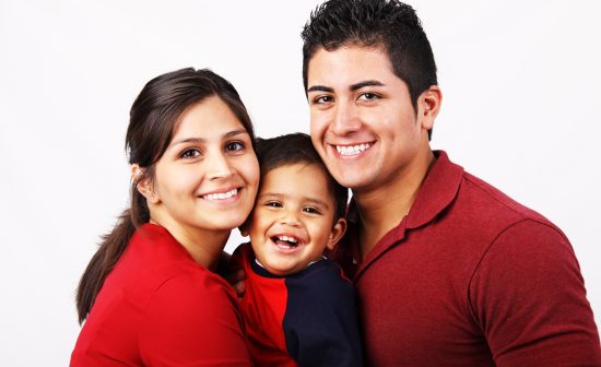 Smiling Happy Family of Three